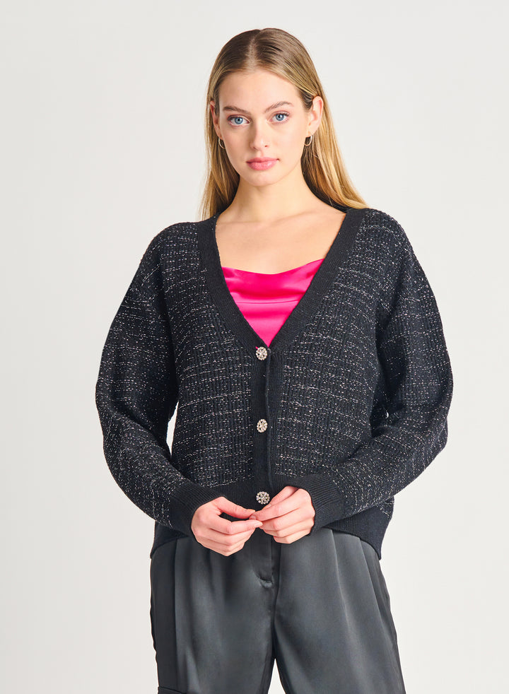 Cardigan noir à bordure ornée de bandes
